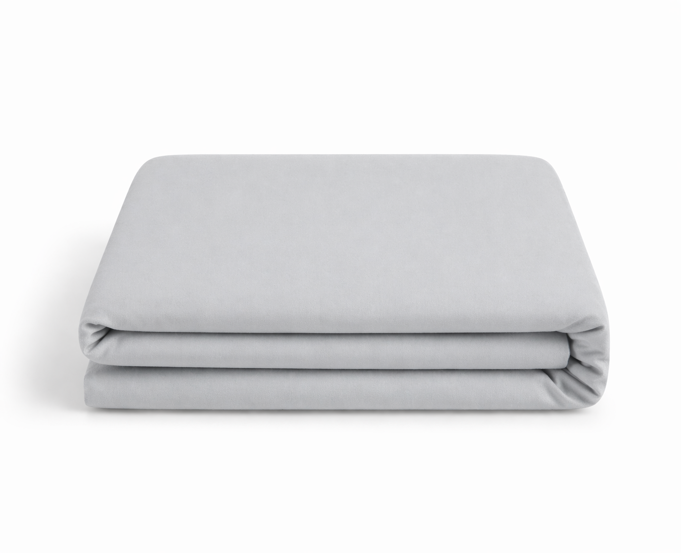 Folded light gray blanket on a white background