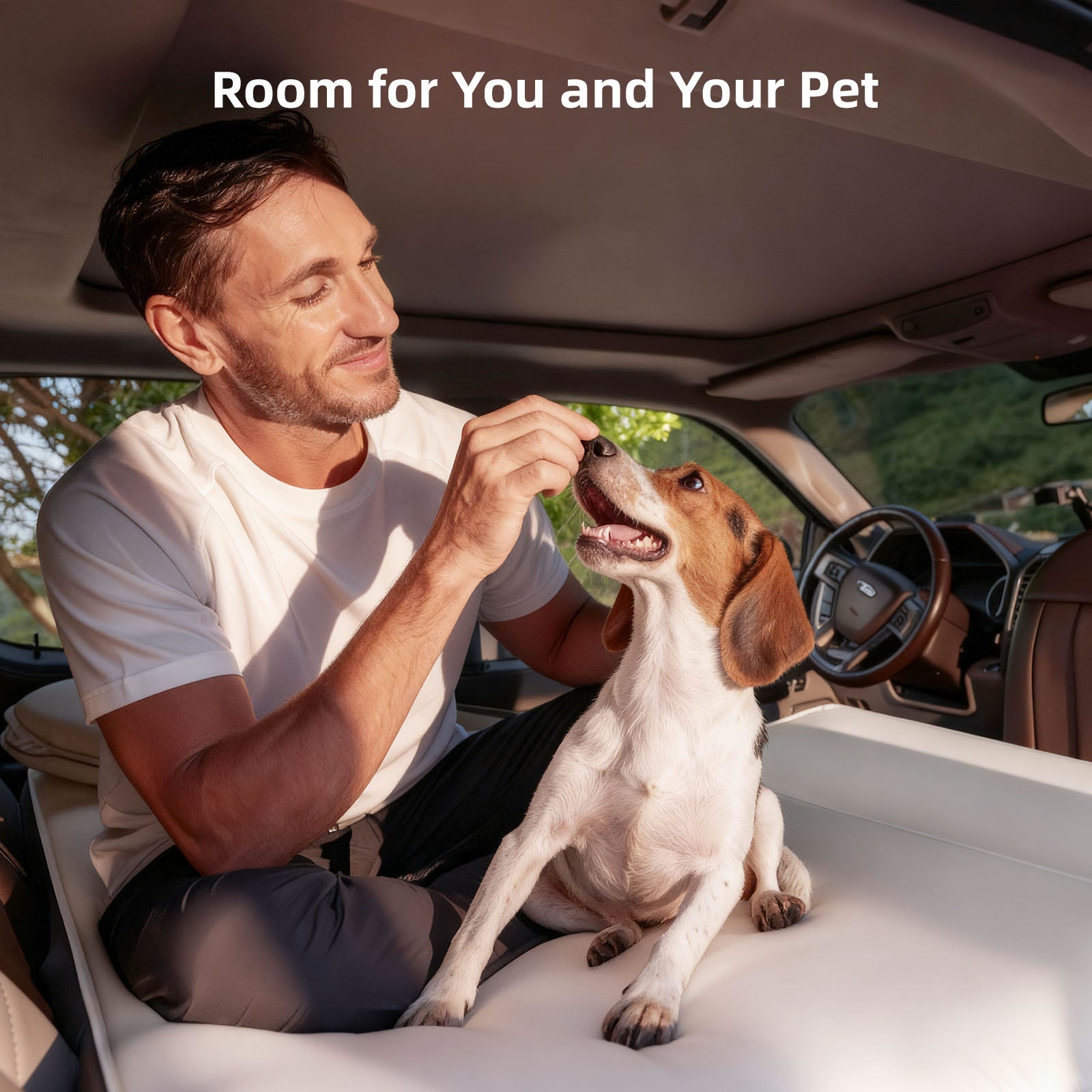 Dog resting comfortably on TPU extension pad for pickup mattress