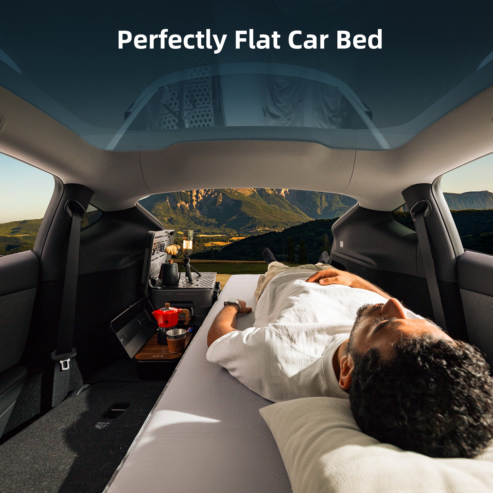 Model lying flat comfortably on Havnby Autolevel Tesla Solo mattress inside Model Y